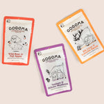 Three GOGOMA freeze-dried pet treat pouches arranged on a light beige background: a red-bordered Wild Boar & Fuji Apple pouch, an orange-bordered Elk Liver & Kabocha Squash pouch, and a purple-bordered Venison & Shiitake Mushroom pouch.